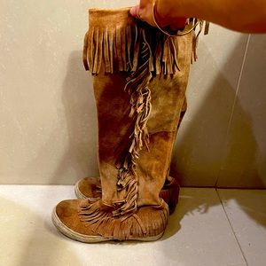 Free People leather fringe knee high boots.
